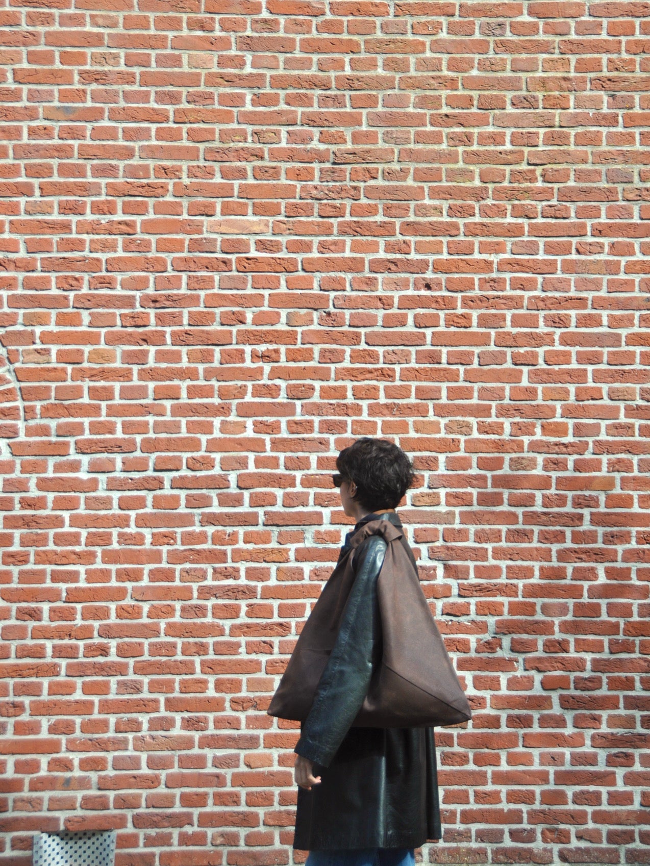 Dark brown waxed canvas origami midi bag by Esra Kayira brand
