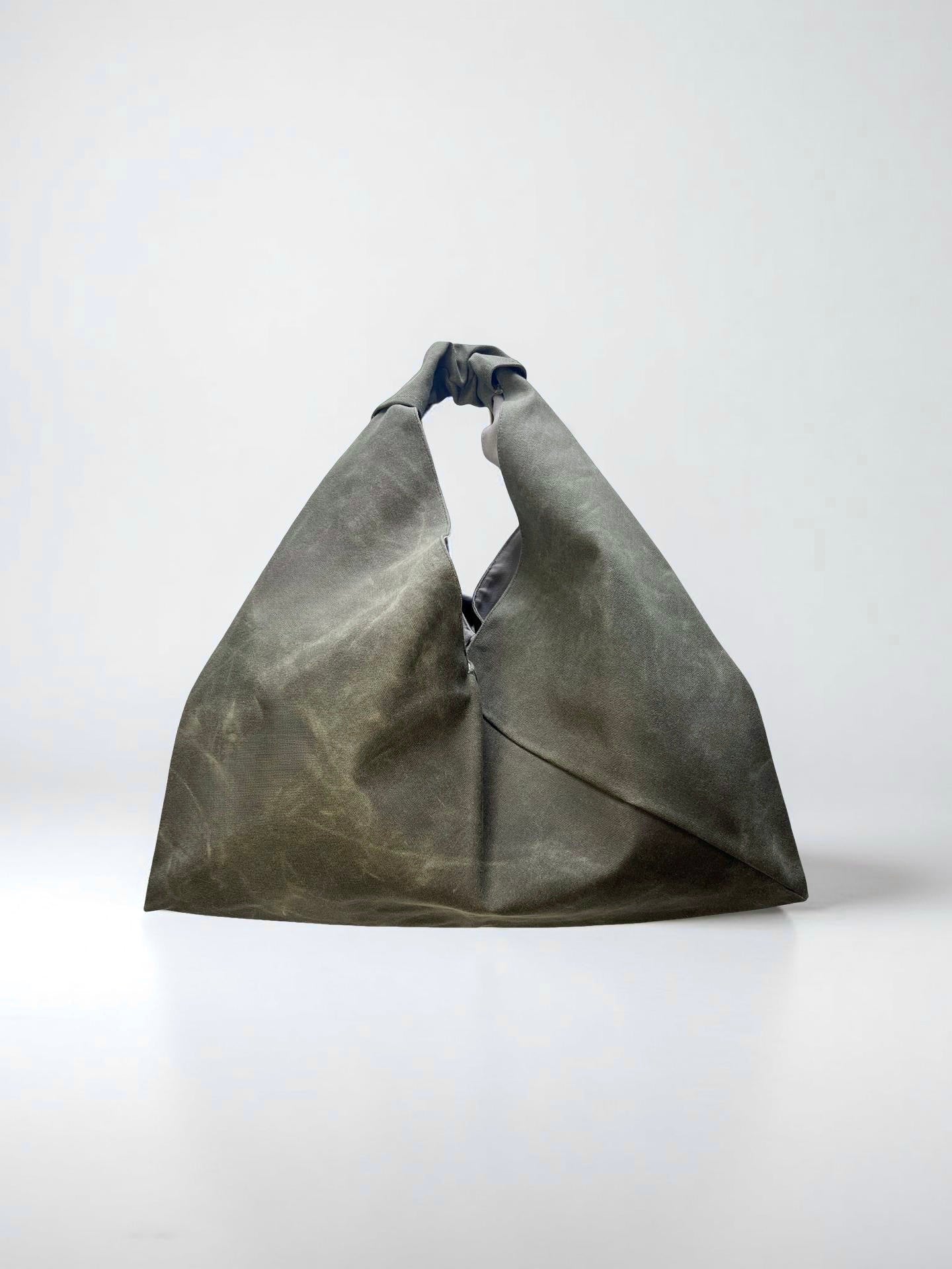 Waxed canvas origami midi bag handcrafted in Turkey by Esra Kayira brand